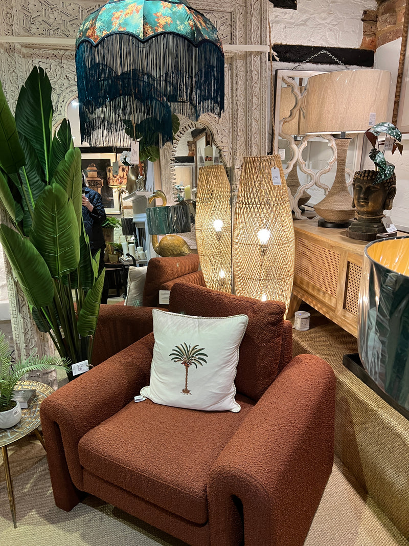 Burnt orange armchair in a soft boucle fabric