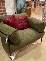 Forest green armchair in a soft boucle fabric